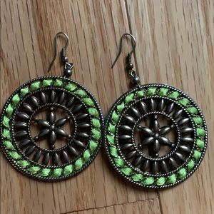 Green circle statement earrings